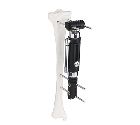 Fijador externo tipo T axial dinámico